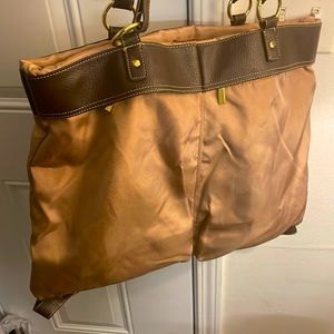 Used. Macy’s Gold & brown fashion laptop bag and women’s purse